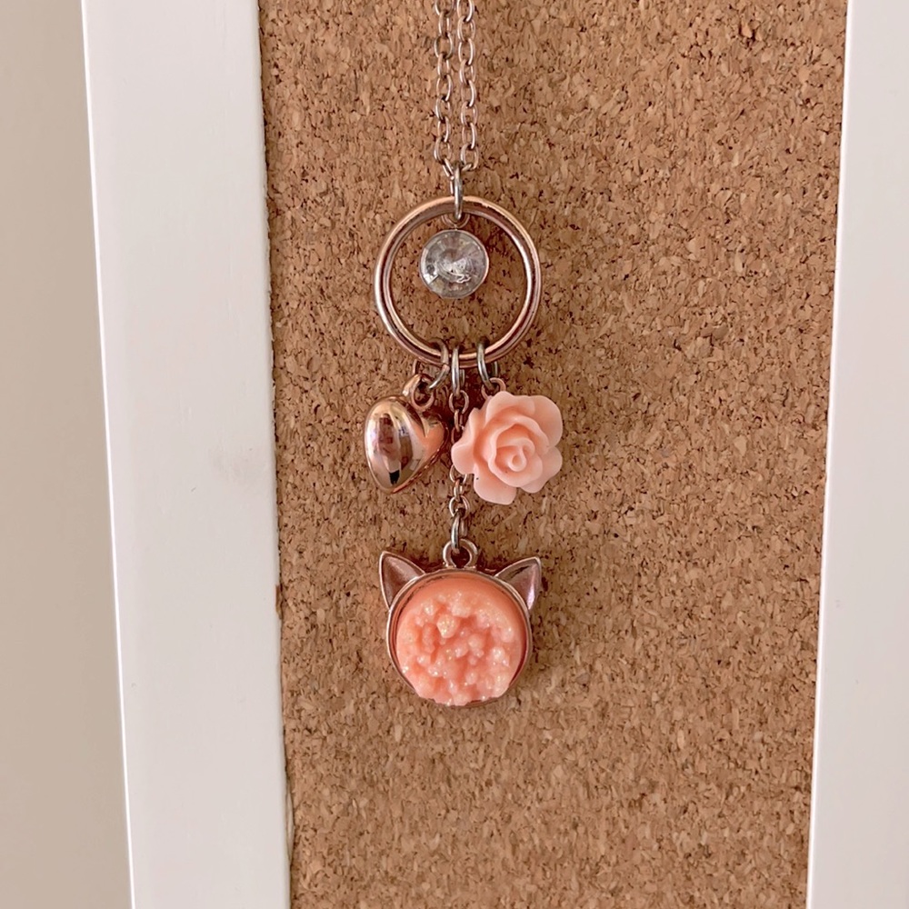 Pastel pink charms and cat necklace